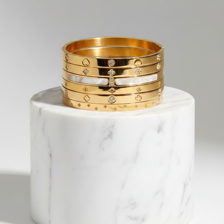 Elegant Hinged Bangel Bracelet in gold with decorative jewels and modern design for stylish stacking.