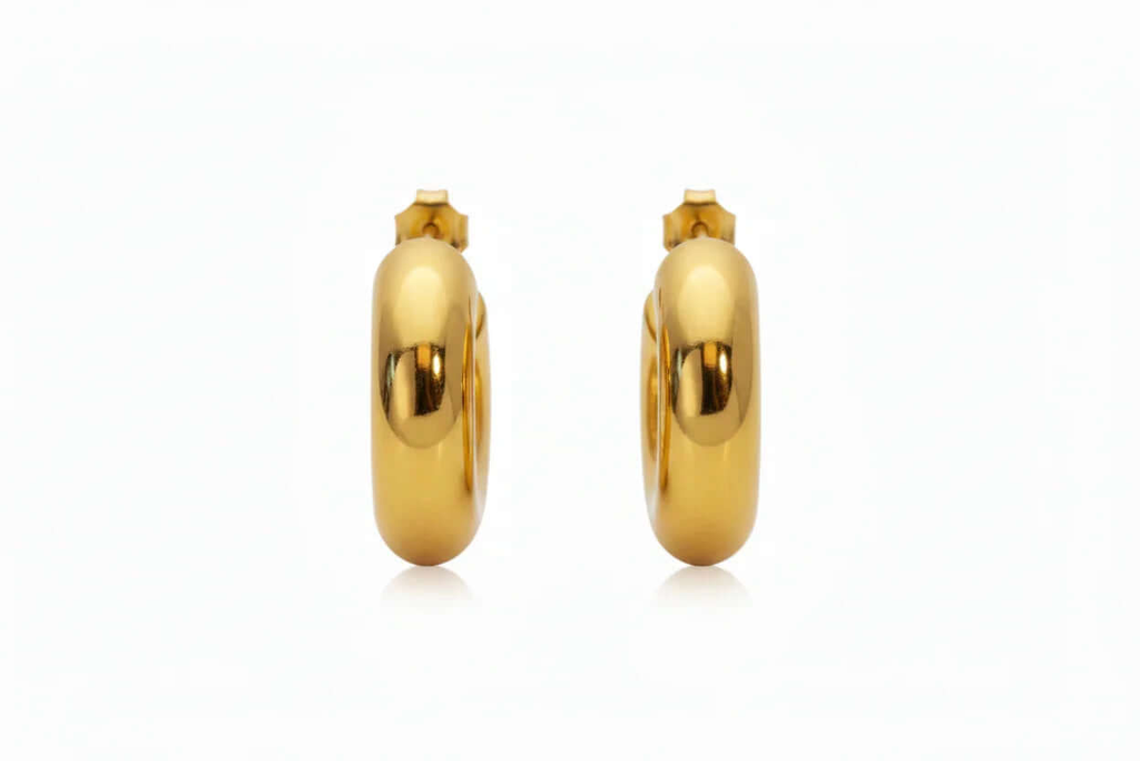 Gold Mini C Hoop Earrings showcasing a smooth rounded silhouette with a high-shine finish.