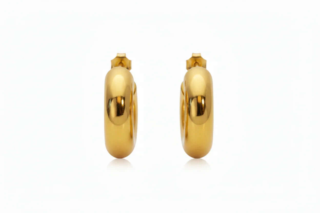 Gold Mini C Hoop Earrings showcasing a smooth rounded silhouette with a high-shine finish.