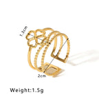 Gold Clover Triple Band Ring with layered design featuring smooth, beaded, and geometric details.