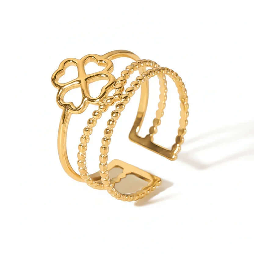 Gold Clover Triple Band Ring featuring layered bands and a clover detail for a luxurious look.