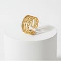 Ceyrah gold adjustable ring with butterfly and chain link design on white background
