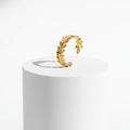 Ceyrah gold leaf adjustable ring with laurel design on white background