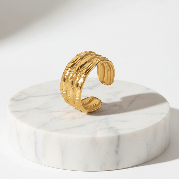 Ceyrah gold open ring with engraved pattern, modern statement jewelry