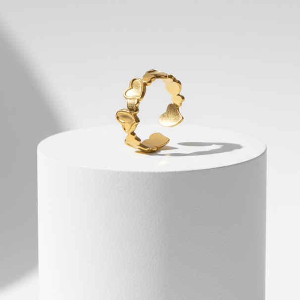 Ceyrah gold heart-shaped adjustable open ring on white background