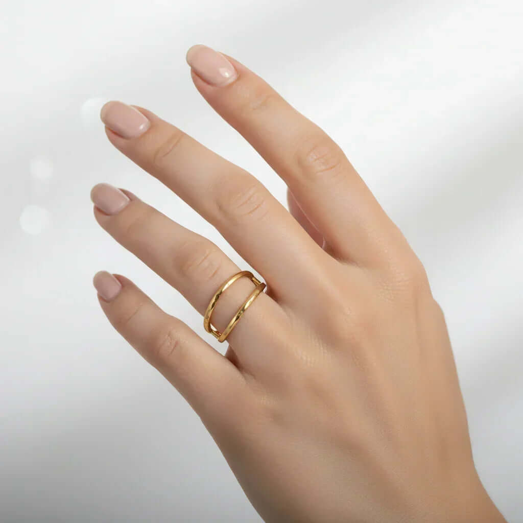 Gold Double Band Open Ring showcased on a hand, featuring a sleek double band design for modern elegance.