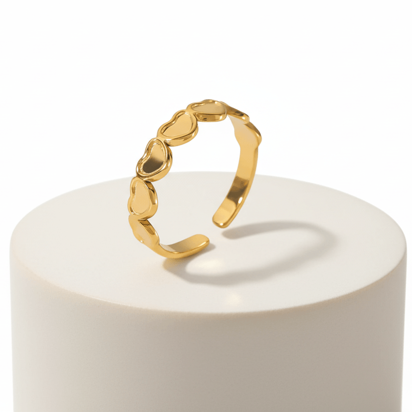 Ceyrah gold heart-shaped open ring on white background