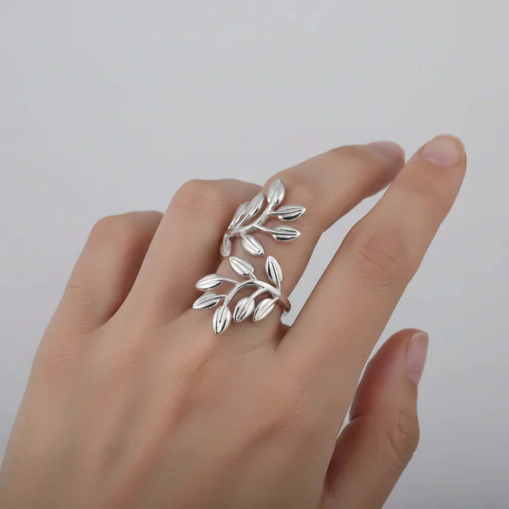 Silver Branch Leaf Adjustable Ring on a hand showcasing its elegant leaf design.