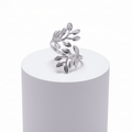 Silver Branch Leaf Adjustable Ring featuring polished leaves on a sculpted silver band.