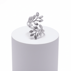Silver Branch Leaf Adjustable Ring featuring polished leaves on a sculpted silver band.