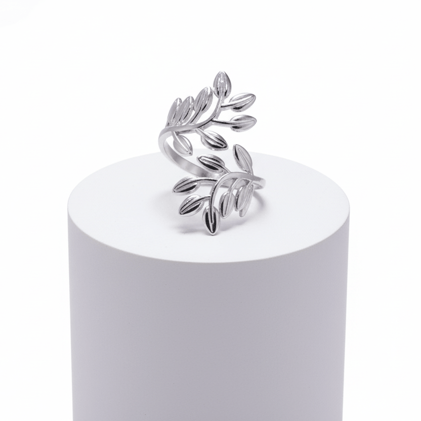 Silver Branch Leaf Adjustable Ring featuring polished leaves on a sculpted silver band.