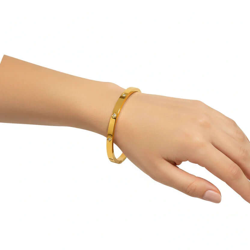 Gold bracelet with crystal accents on wrist, Ceyrah jewelry product photo