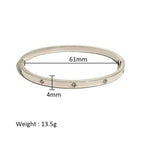 Ceyrah silver bangle bracelet with crystal accents, 61mm diameter, 4mm wide, 13.5g weight