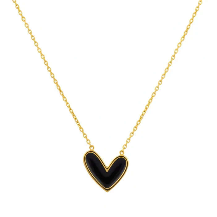 Gold chain necklace with black heart pendant on white background, Ceyrah jewelry