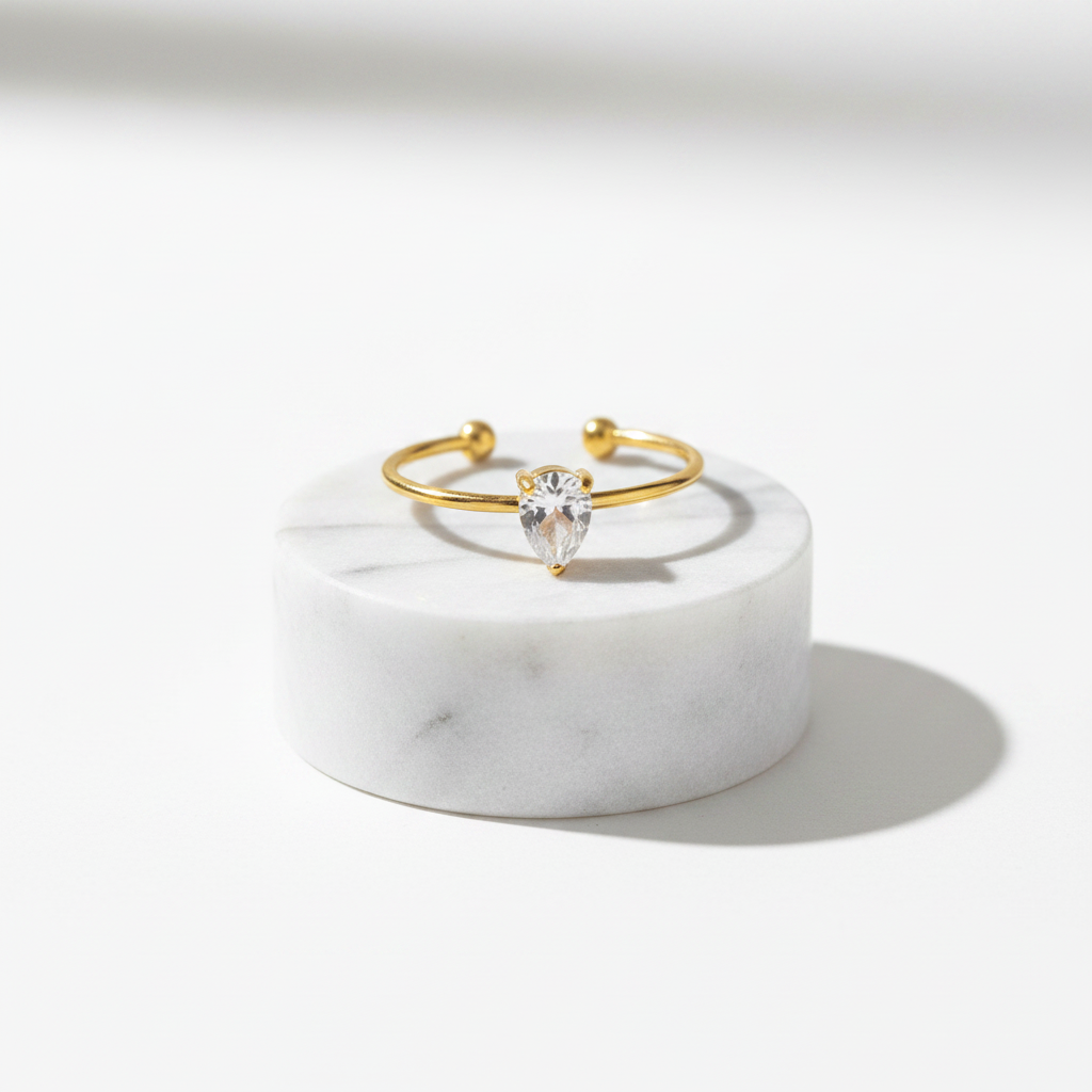 Gold open band ring with teardrop clear gemstone, Ceyrah jewelry
