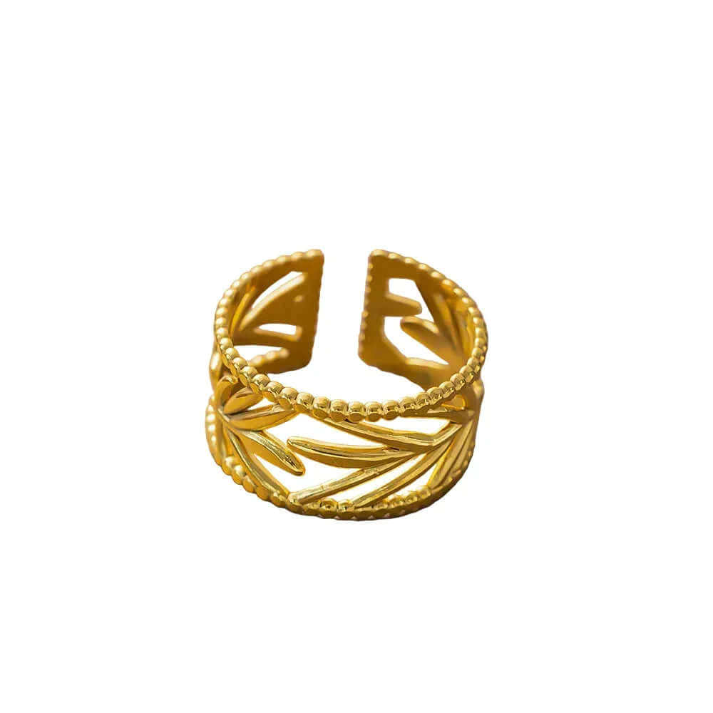 Leaf Etched Adjustable Ring showcasing intricate leaf etching and a beaded edge in a golden finish.