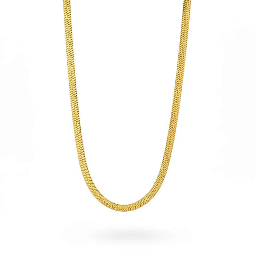 Gold herringbone chain necklace on white background, Ceyrah jewelry.