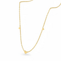 Ceyrah gold chain necklace with three small heart charms on white background