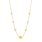 Elegant gold necklace with geometric charms and crystals on a light background, Ceyrah jewelry