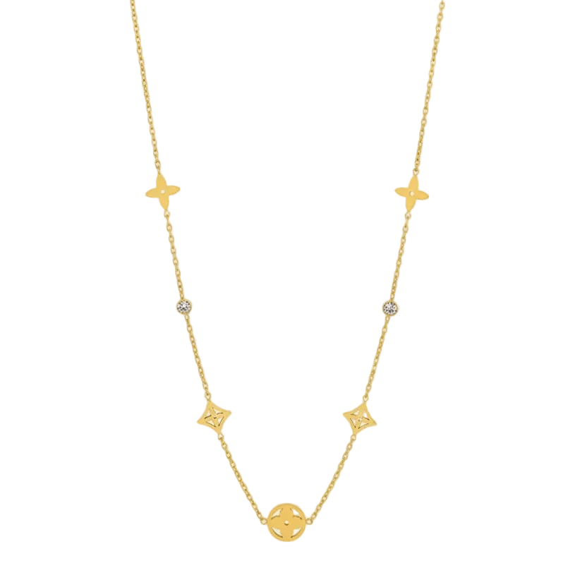 Elegant gold necklace with geometric charms and crystals on a light background, Ceyrah jewelry
