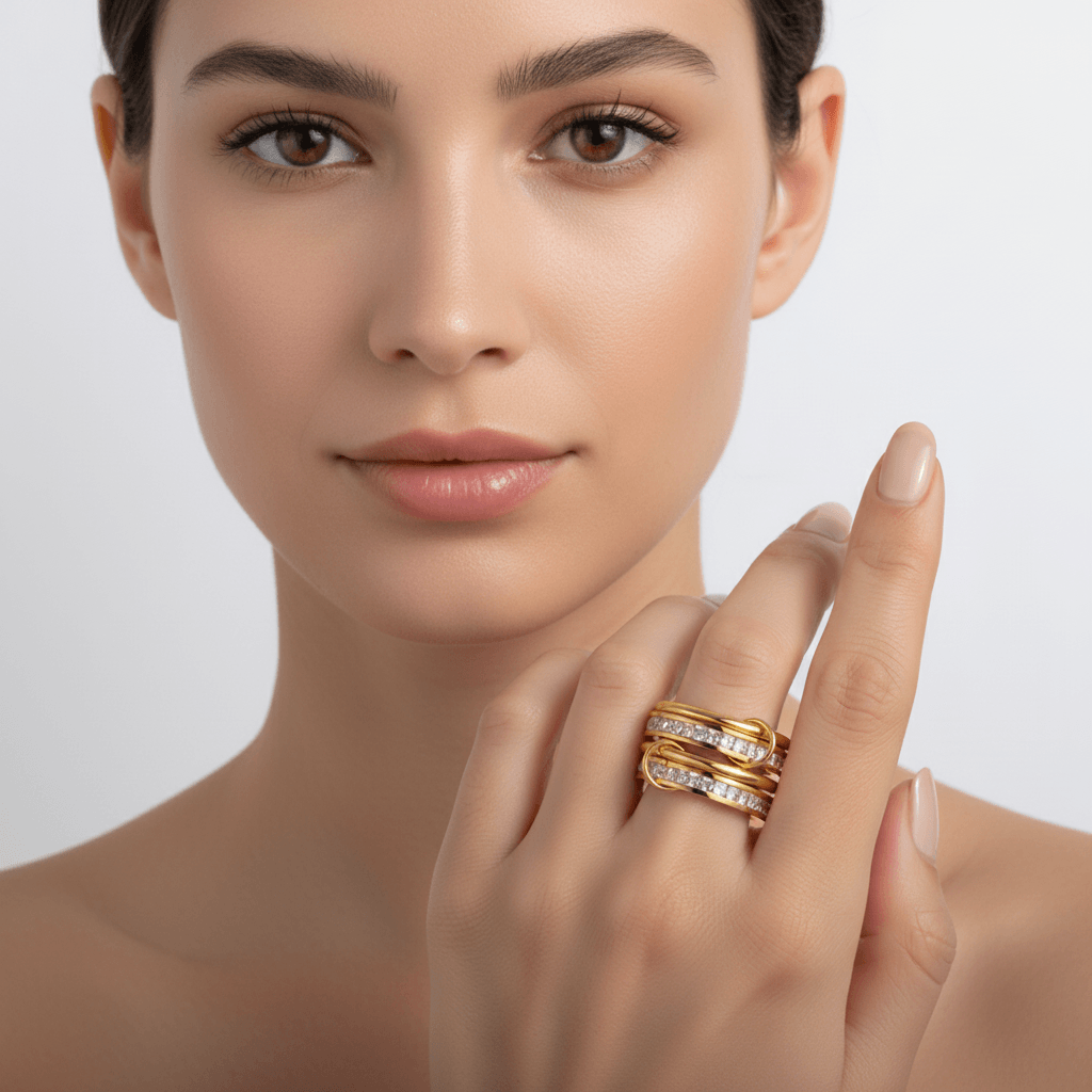 Four Layered Gold Eternity Ring worn by a model, showcasing its luxurious design and sparkling stones.