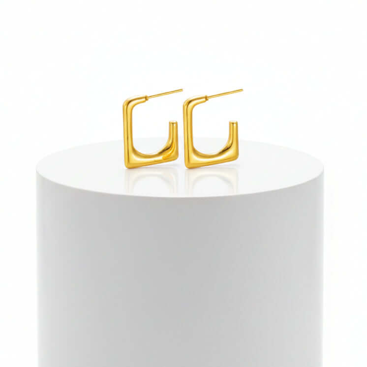Gold Geometric U-Shaped Stud Earrings on a white background