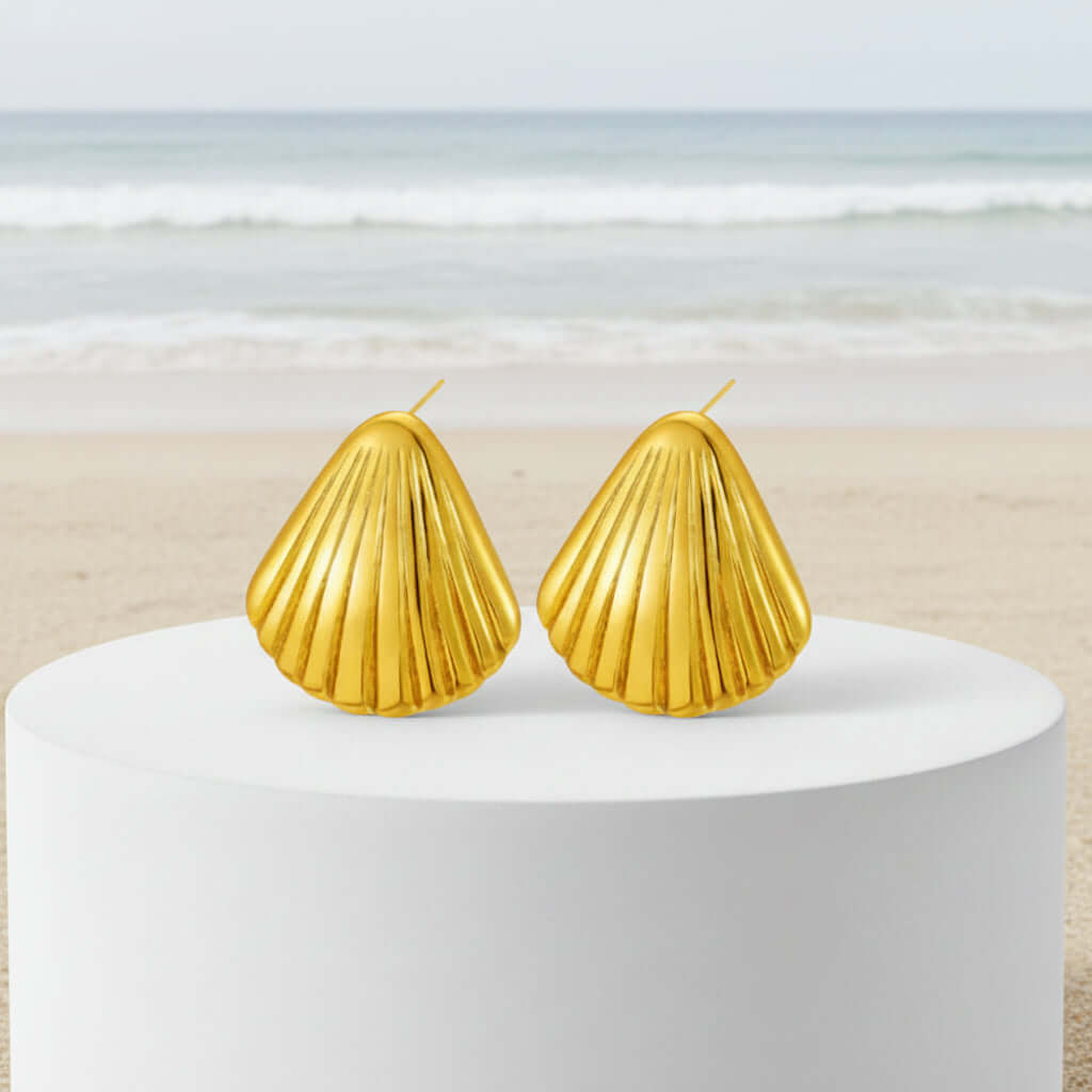 Ceyrah - Gold Shell Ribbed Stud Earrings with vertical ribbed detailing and high-polish finish, perfect for any occasion.