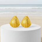 Ceyrah - Gold Shell Ribbed Stud Earrings with vertical ribbed detailing and high-polish finish, perfect for any occasion.