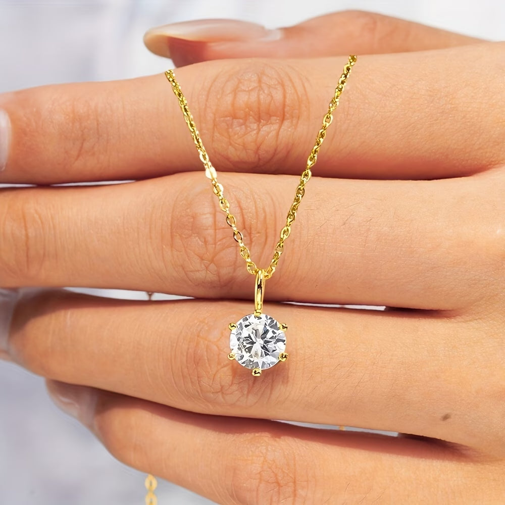 necklace in hand from Gift box with necklace