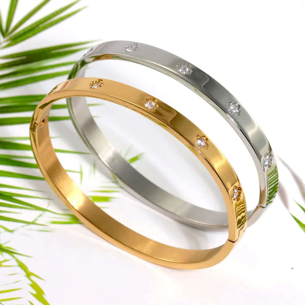 Gold and silver Big Clover Crystal Bangle Bracelet on white background, Ceyrah jewelry
