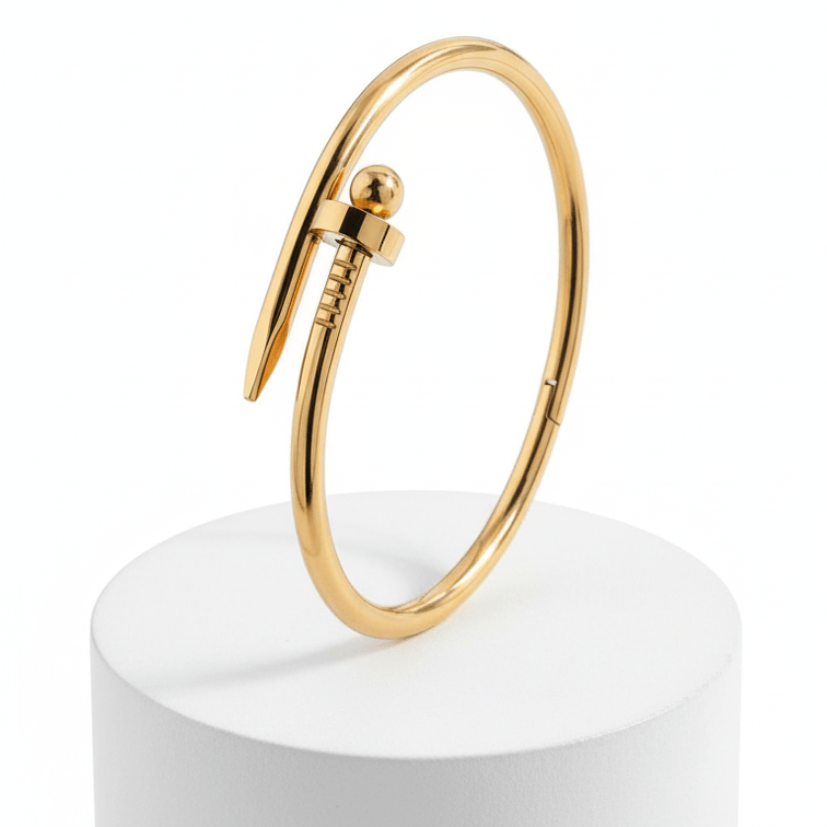 Bread Nail Bangle Bracelet on white pedestal