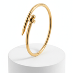 Bread Nail Bangle Bracelet on white pedestal