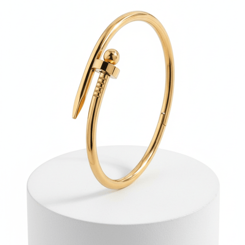 Bread Nail Bangle Bracelet on white pedestal