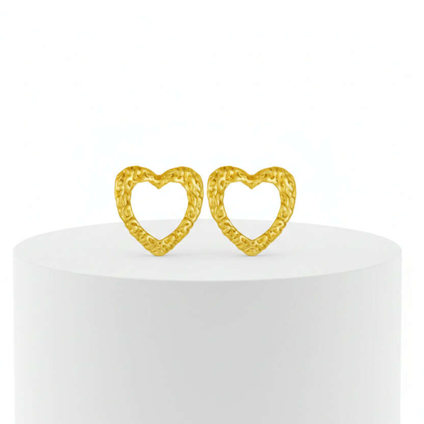 Ceyrah textured gold heart-shaped earrings pair on white background
