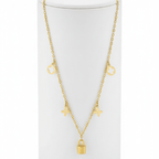 Clover Charm Necklace with Lock Pendant on a white cylindrical stand