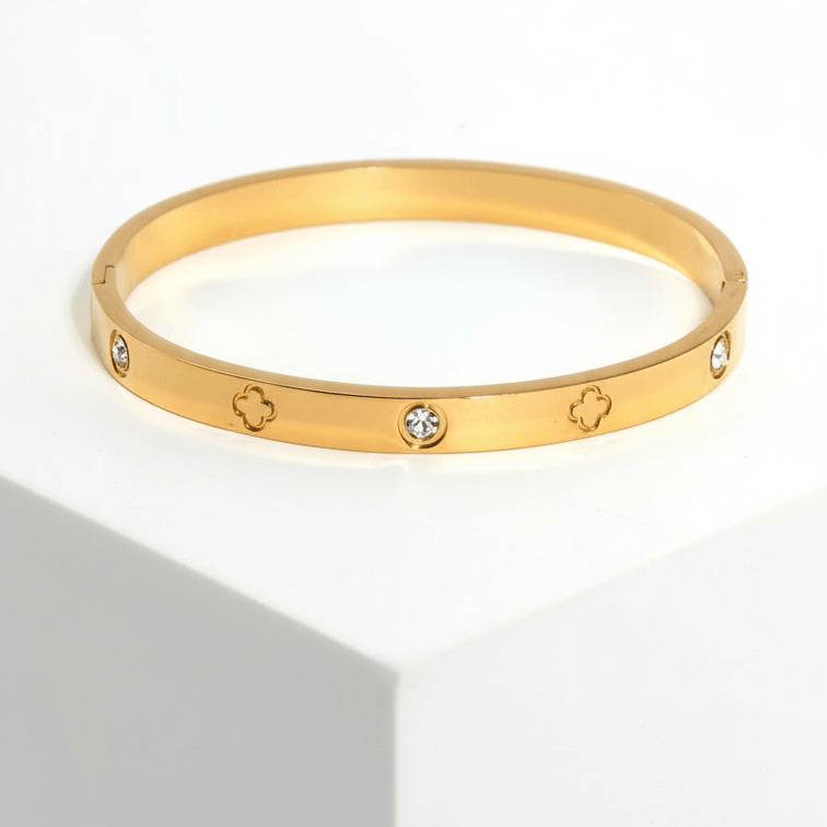 Clover Engraved Diamond Bangle Bracelet on pedestal