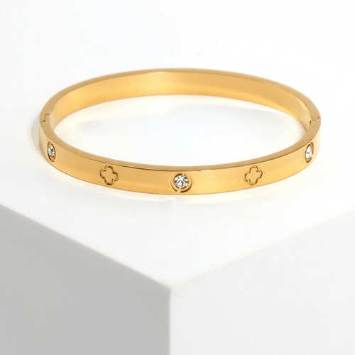 Clover Engraved Diamond Bangle Bracelet on pedestal
