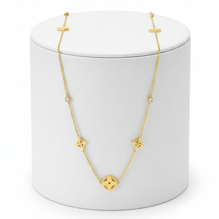 Clover Square Gold Necklace on pedestal