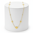 Clover Square Gold Necklace on pedestal