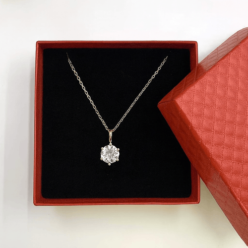 Gift Box with Necklace featuring a delicate gold chain and white diamond pendant in elegant packaging.