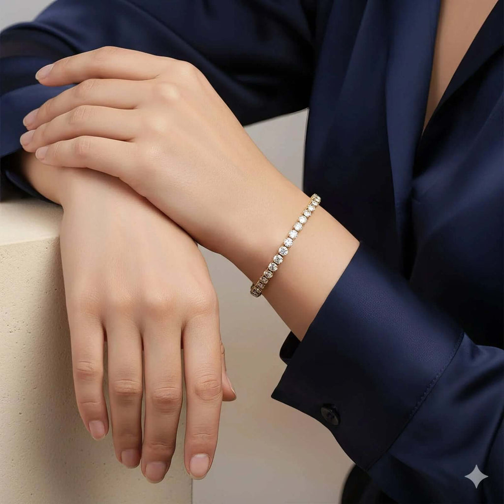 Gold Crystal Tennis Classic Bracelet worn on a woman's wrist, showcasing its elegant sparkle and minimalist design.