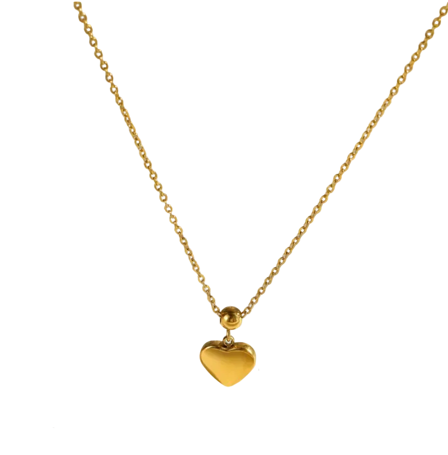 Gold heart pendant necklace on a delicate gold chain, displayed against a light beige background 