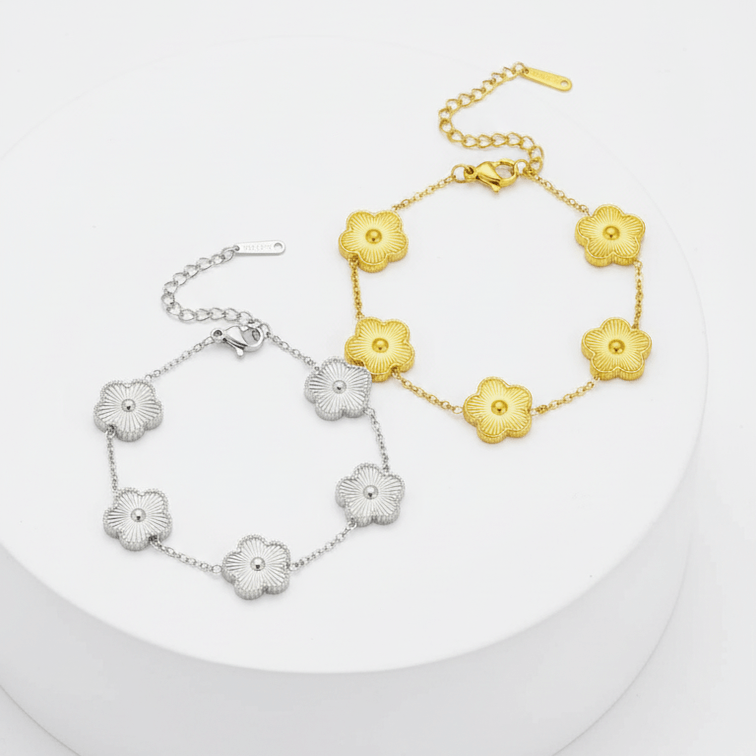 Five Leaf Clover Bracelet featuring silver and gold flower designs on adjustable chains.
