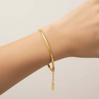 Ceyrah gold Flat Snake Chain Bracelet with adjustable chain on wrist, minimalist jewellery