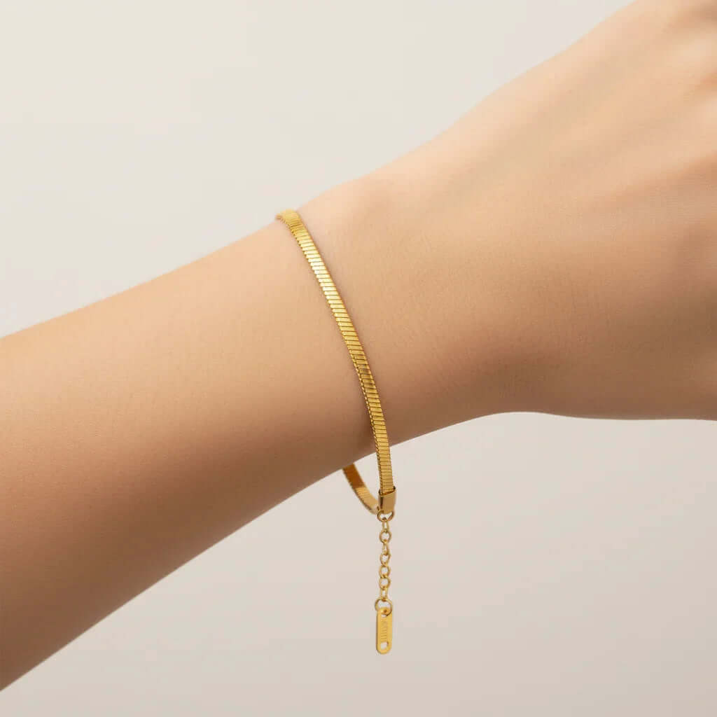 Ceyrah gold Flat Snake Chain Bracelet with adjustable chain on wrist, minimalist jewellery