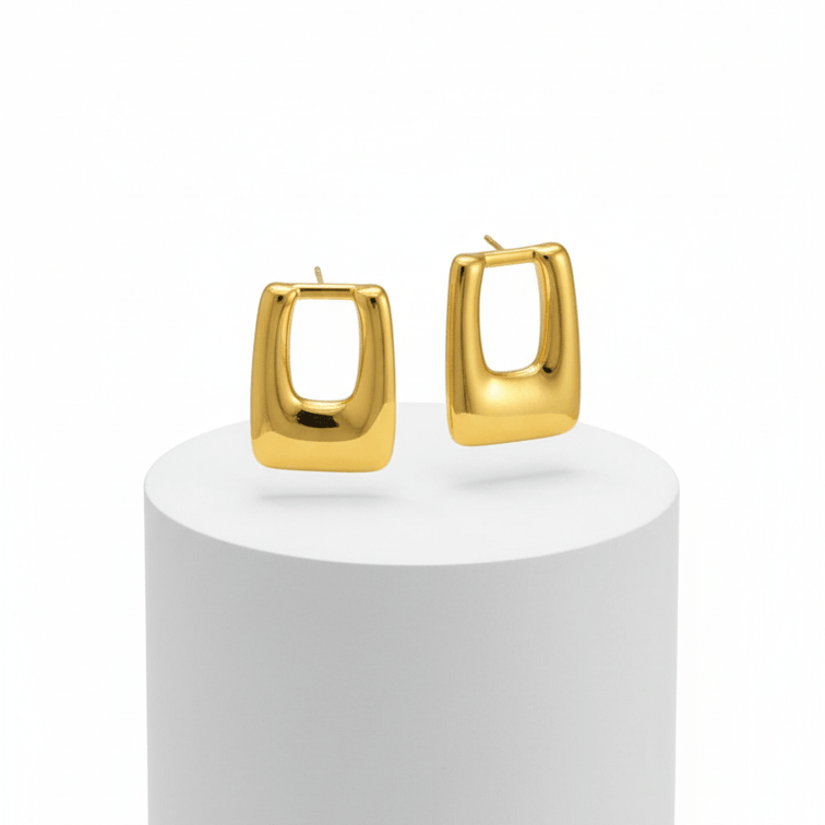 Geometric Rectangle Stud Earrings on a white cylindrical stand against a white background