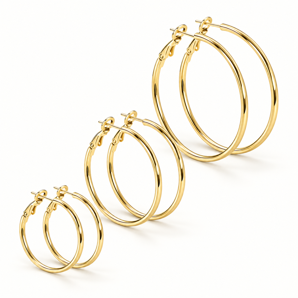 three pairs of Waterproof Trio of Classic Hoop Earrings in different sizes, arranged diagonally on a clean white background.