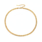 Gold 6mm Curb Chain Necklace plain background