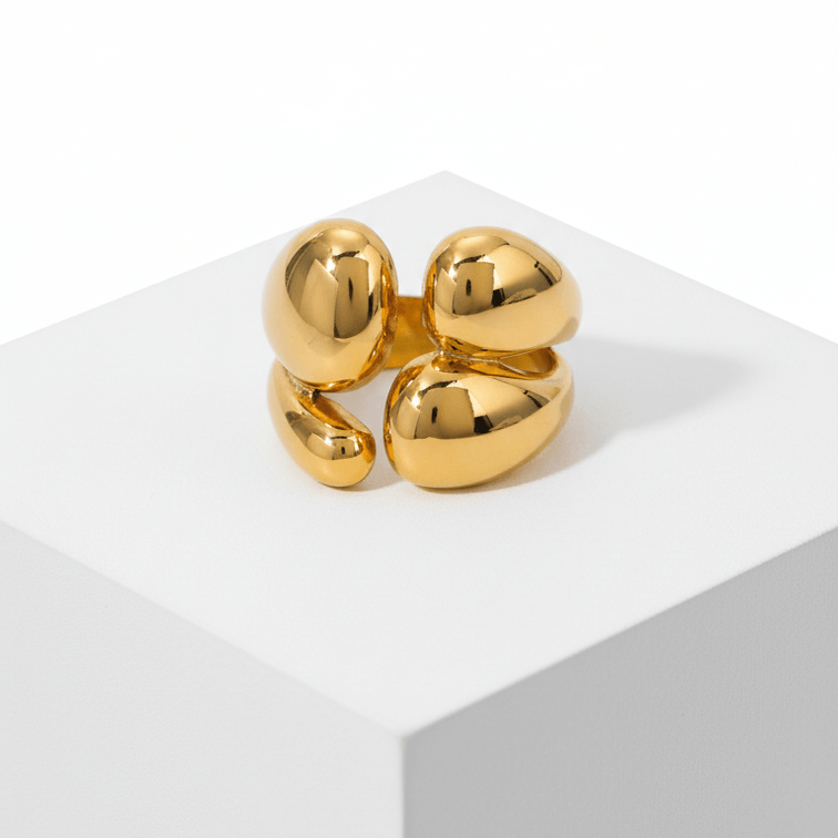 Gold Abstract Statement Ring on square pedestal 