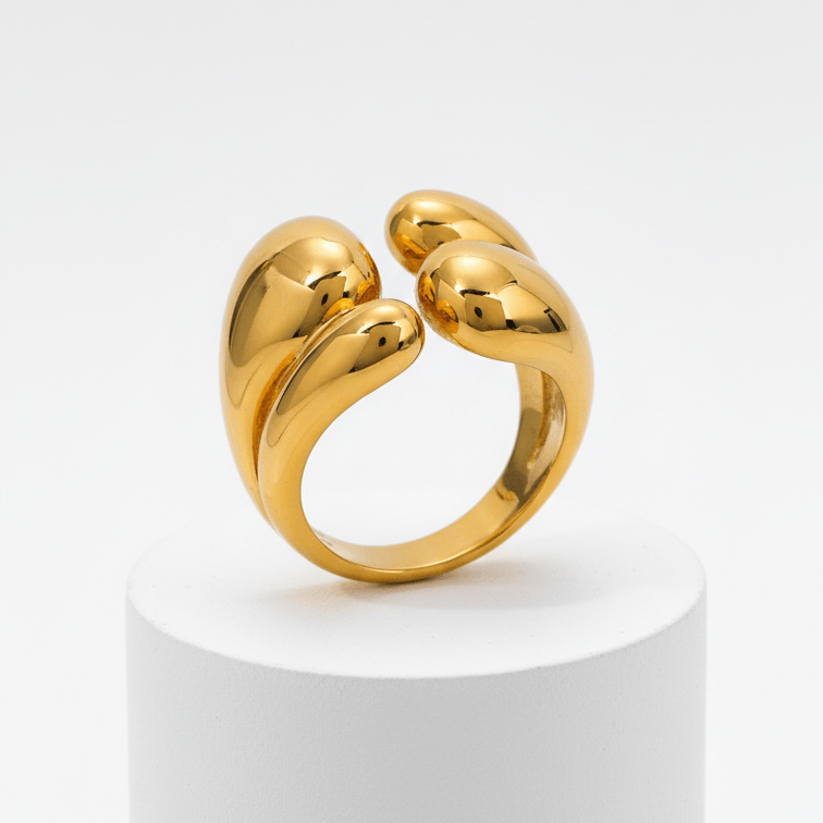 Gold Abstract Statement Ring on pedestal display